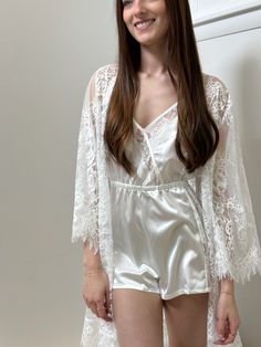 Slip into luxury with the Sara Romper. This silky smooth romper features delicate lace side panels and adjustable straps for a perfect fit. Perfect for your bridal morning or adding a touch of elegance to bedtime, we love her under our lace robes as well. White Lounge Set, Lace Robes, White Lounge, Wedding Morning, Silk And Lace, Lace Side, Essential Dress, Morning Wedding, Lace Romper