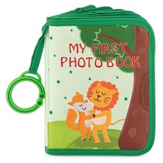 a book with a keychain attached to it and an image of a lion on the cover