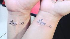 two wrist tattoos with the words love and hearts