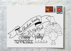 an envelope with a turkey and banner on it