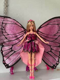 a barbie doll dressed as a butterfly