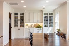 the kitchen is clean and ready to be used for dinner or other entertaining purposes in someone's home