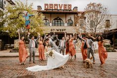 a bride and groom with their bridal party