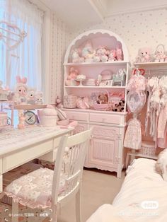 a room filled with lots of stuffed animals and toys on top of white furniture next to a window