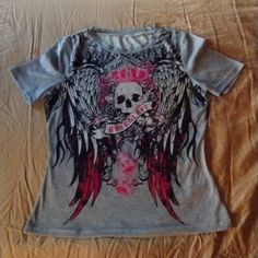 Brand New Tshirt With Gorgeous Skull And Wings In Pink Black And Grey! It's Absolutely Beautiful! Size Small!!!!! Perfect For Spring And Summer! Cute Skeleton Tshirt, Edgy Skull Print Short Sleeve Top, Edgy Short Sleeve Top With Skull Print, Y2k Skull Print Crew Neck T-shirt, Pink Cotton Emo T-shirt, Trendy Pink Skull Print Top, Trendy Pink Tops With Skull Print, Trendy Pink Top With Skull Print, Edgy Skull Print Crew Neck Top