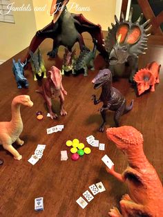 toy dinosaurs playing cards on a table with other toys in front of them and the caption says, i can't do that