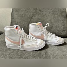 Elevate Your Sneaker Game With These Nike Blazer '77 Vintage Mid White Pink Oxford W Sneakers. The Stylish Mid-Top Shoe Shaft Is Perfect For Women Who Want To Make A Statement With Their Footwear. The Upper Material Is Made Of High-Quality Leather That Is Sure To Last For Years To Come. These Sneakers Come In A Beautiful White And Pink Color Combination That Is Perfect For Any Athletic Outfit. The Nike Blazer Model Is A Classic That Has Been Tried And Tested Over The Years, Making It A Reliable Choice For Any Active Woman. These Sneakers Are Available In Us Shoe Size 9 And Are Part Of The Nike Blazer Product Line. Blazer High Tops Outfit, Nike Blazer 77 Vintage, Style Nike Blazer, High Tops Outfit, Blazer 77, Athletic Outfit, Pink Color Combination, Mid Top Shoes, Sneaker Games