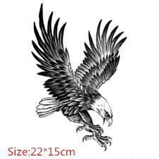 an eagle is flying with its wings spread out and talons extended to the side