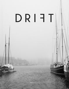 two boats are docked in the water on a foggy day with words drift above them