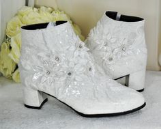 A Beautiful White Lace Bridal Boot, A Comfortable Handmade boots decorated with elegant lace and floral embellishments. These custom wedding boots are perfect for brides, bridesmaids, mother of the bride, evening shoes and special occasions. Extra padded soles and a delicate low kitten heel make these shoes comfortable for 12 hour wear.  Design Details: * Handmade Satin Wedding Boots * Comfortable Shoes with cushioned insoles. * Heel Height: 6cm * Colour Availability: Bridal white  * Elegant Lac White Bridal Shoes, Handmade Boots, Bridal Boots, Boots Comfortable, Wedding Boots, Handmade Boot, Womens Wedding Shoes, Lace Bridal, Bride Shoes