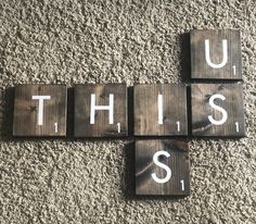 wooden blocks spelling out the word'this is us '