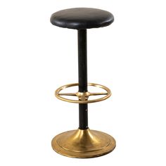 a black and gold bar stool with a round foot rest on an isolated white background