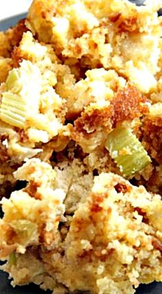 a close up of food on a plate with some sort of breaded item in the middle