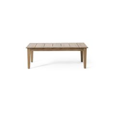 a wooden table sitting on top of a white floor