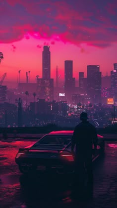 a man standing next to a parked car in front of a city skyline at sunset