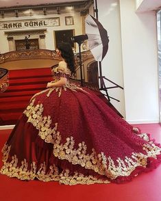 Red And Gold Wedding Tuxedo, Quince Red Dress With Gold, Quincenera Dresses Maroon, Maroon 15 Dresses Quinceanera, Red Flower Quinceanera Dresses, Burgundy Quinceanera Dresses Mexican, Burgundy Xv Dresses, Red Quinceanera Dresses Long Sleeve