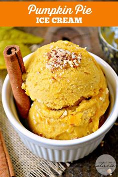 pumpkin pie ice cream in a bowl with cinnamon sticks