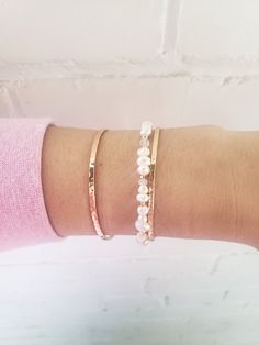 * This dainty bracelet is perfect for a wedding or layered with bangles! Dress it up or down. * Genuine freshwater pearls are arranged thoughtfully among 14k gold filled beads, and faceted rainbow moonstone. No one of these bracelets will be exactly the same, making each one unique 💫 * Secure with all 14k gold filled findings and easy to use lobster clasp. * Made from top quality materials, gold fill won't tarnish or turn, wear 24/7. **Pro tip** For measuring your wrist- If you don't have a fle Rose Gold Beaded Bracelets With Pearl Charm, Delicate Stackable Rose Gold Bracelets, Delicate Rose Gold Stackable Bracelets, Feminine Adjustable Beaded Bracelets For Wedding, Elegant Hand Wrapped Beaded Bracelets For Everyday, Elegant Hand-wrapped Beaded Bracelets For Everyday, Rose Gold Stackable Wedding Bracelet, Dainty Beaded Bangle Bracelets, Minimalist Gold Beaded Bracelets As Bridesmaid Gift