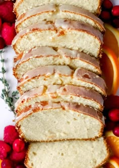 sliced loaf of orange and raspberry pound cake