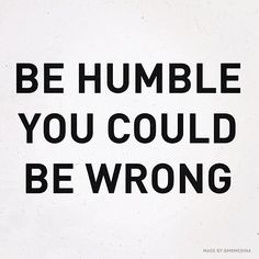 the words be humble you could be wrong written in blue ink on a white background