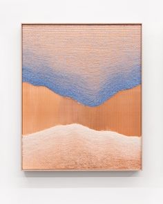 an abstract painting on a white wall with blue and orange colors in the background,