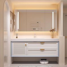 a bathroom with a large mirror above the sink and a white counter top under it