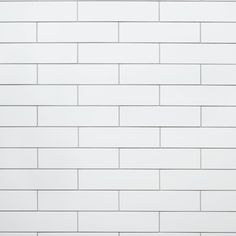 a white brick wall with no mortars on it