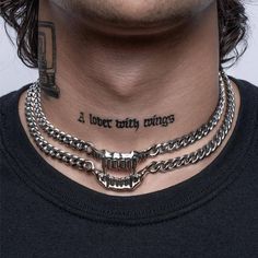 a man with a tattoo on his neck has a chain around his neck that says i love my things