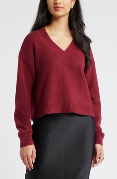 Amp up your cozy vibe in this slouchy V-neck designed with ribbed trim for a soft look and feel. 21" length (size medium) V-neck Long sleeves 40% nylon, 36% acrylic, 20% cotton, 4% spandex Hand wash, dry flat Imported Red Grape, Red Grapes, Red Sweaters, V Neck Sweater, Neck Designs, Vneck Sweater, Sweater Top, Top Brands, Hand Wash