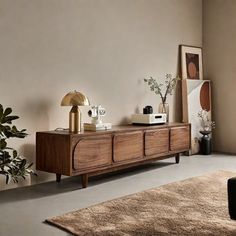 a living room with a large rug and wooden furniture in it's centerpiece