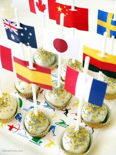 cupcakes decorated with flags and confetti