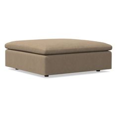 an ottoman that is sitting on top of a white surface and has a brown cover