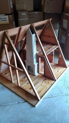 an image of a house made out of wood and some kind of roofing material