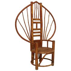 a chair made out of wood and wicker with a ladder on the back of it