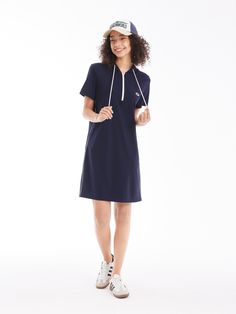 Details: Vintage navy urban light sports dressSimple Hooded Dresses for Golfcore Golf OutfitsHood with drawstring and half zip fasteningContoured straight fit Materials & Care: Viscose fibre 60.8%Nylon 30.5 %Spandex 8.7 % Hand wash | Dry clean Do not bleach Size & Fit: Model is 5'7", Bust 32, Waist 24, Hips 35, wearing a size S Item #: SN2DR29 Polo Dress Outfit, Urban Light, Chic Business Casual, Denim Jean Dress, Hooded Dress, Sport Dress, Draped Dress, Polo Dress, Shirt Sale