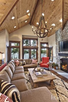 a living room filled with furniture and a fire place