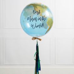 a blue balloon with the words best mum in the world on it