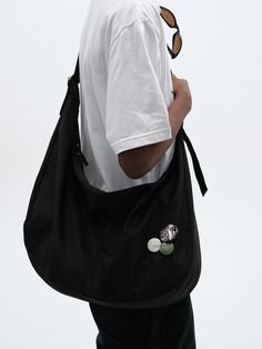 This is a comfortable and trendy cross bag by SUADE that is made out of high quality polyester 100% blend fabric. With unique design detail with trendy look, it will stand out from your casual and young daily outfit.- Two way zipper closure- Adjustable strap length- Incision detail Trendy Streetwear Shoulder Bag With Adjustable Strap, Streetwear Tote Shoulder Bag With Zipper Closure, Streetwear Tote Shoulder Bag With Zipper, Casual Black Chest Bag With Detachable Strap, Trendy Nylon Hobo Crossbody Bag, Streetwear Satchel Shoulder Bag With Zipper Closure, Casual Nylon Crossbody Hobo Bag, Streetwear Satchel Shoulder Bag With Zipper, Trendy Streetwear Bags With Adjustable Strap