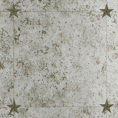 an old white tile floor with three stars on the bottom and one star in the middle