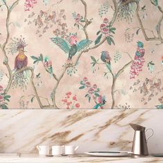 the wallpaper is decorated with birds and flowers