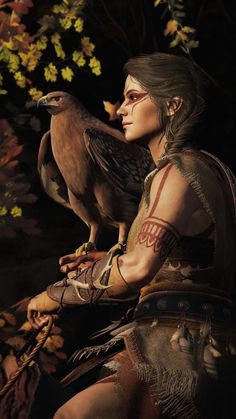 a woman holding a bird on her arm