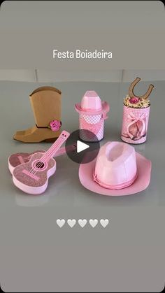 a pink hat, boots and other items are on the table with text that reads festa boidadera