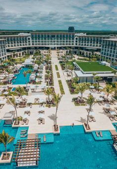 an aerial view of the resort and pool area