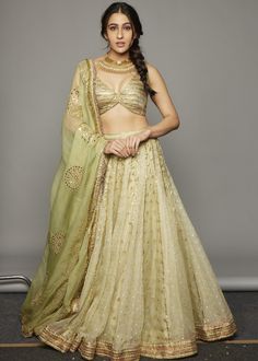 Mint green lehenga embroidered with gota patti edge with lampi stripes. Mint green organza dupatta embroidered with gota patti fine with kiran & gold metallic blouse. Chikankari Lehenga, Gold Lehenga, Bridesmaid Lehenga, Metallic Blouses, Green Lehenga, Embroidered Lehenga, Traditional Indian Outfits, Sara Ali Khan, Ali Khan