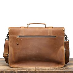 Full Grain Leather Laptop Bag, Men Briefcase Messenger Bag This is a classic design made with selected genuine cow leather, which the leather is very thick and top quality. It can be carried as a everyday bag for men perfectly. The bag can be fit for a 14'' inches laptop very well, also there are many pockets inside and outside of the bag, which can make your everything in organization. Features: • Long Adjustable Shoulder Strap • Solid Quality Hardware • Canvas Lining • Inside zipper pocket, cell pocekt, and purse pocket Specifications: •Dimensions: 15" L x 11"H x 3.5"W inches (38 cm x 28 cm x 9 cm) •Color:Vintage Brown/Coffee Brown Business Travel Bag With Smooth Grain, Brown Leather Satchel With Luggage Sleeve, Leather Cognac Satchel With Luggage Sleeve, Vintage Brown Leather Bag With Luggage Sleeve, Classic Vegetable Tanned Leather Shoulder Bag For Travel, Brown Smooth Grain Travel Bag For Business, Rugged Leather Satchel Briefcase, Vintage Brown Business Bag With Leather Lining, Classic Vegetable Tanned Leather Shoulder Bag