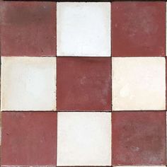 a red and white checkerboard pattern is seen in this image, it appears to be tile