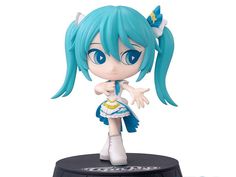 an anime character figurine with blue hair and white dress on top of a black base