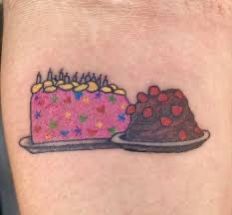 a piece of cake on the left side of the arm is shown with pink frosting and sprinkles