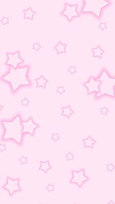 a pink background with white stars on it