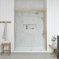 a bathroom with a walk in shower next to a wooden bench